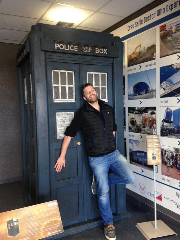 Joe Ford leaning sexily against the TARDIS