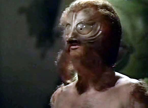 Vega Nexos, a short of hairy shirtless satyr with big eyes