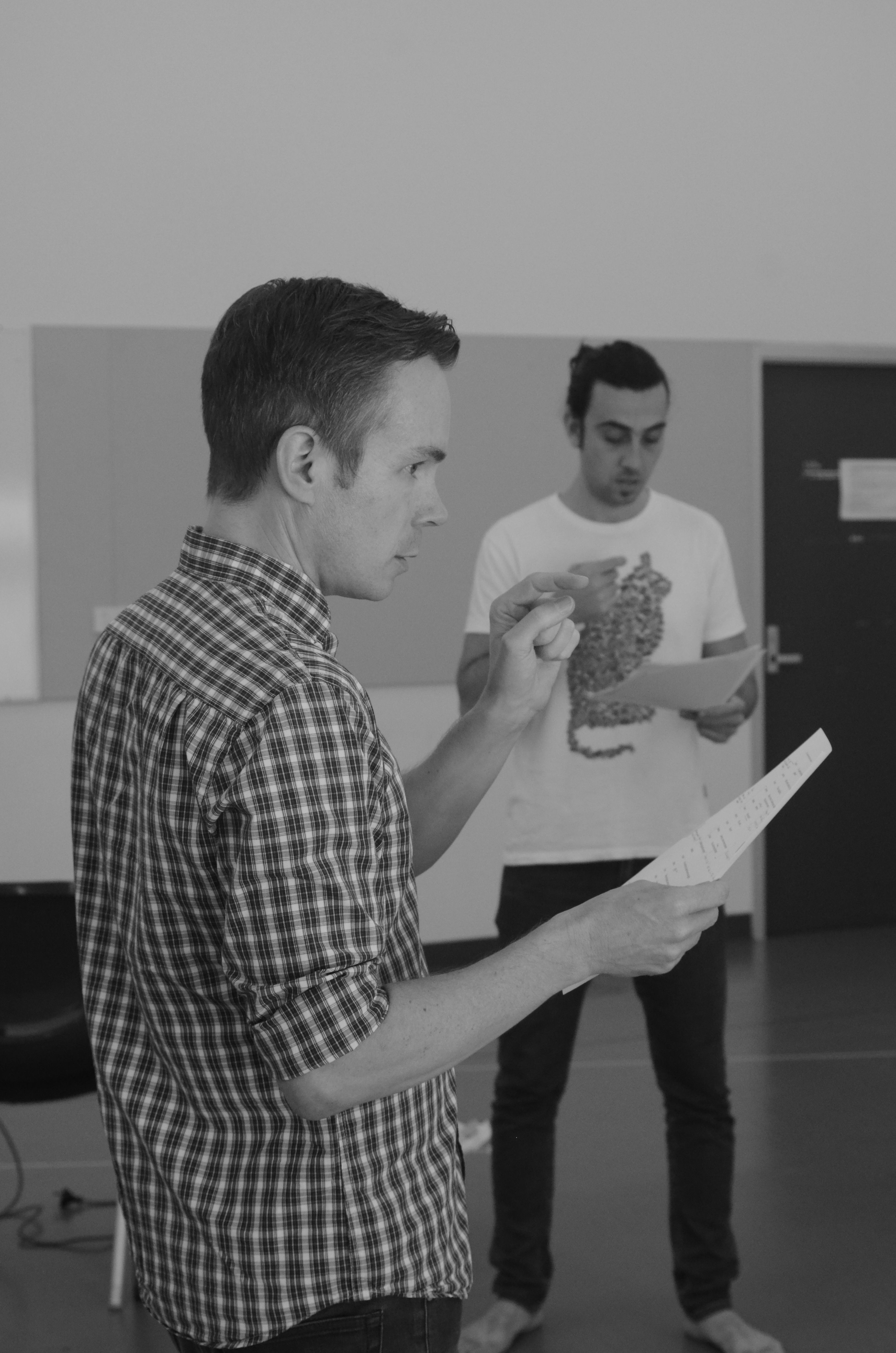 Corey giving important instructions while holding a piece of paper
